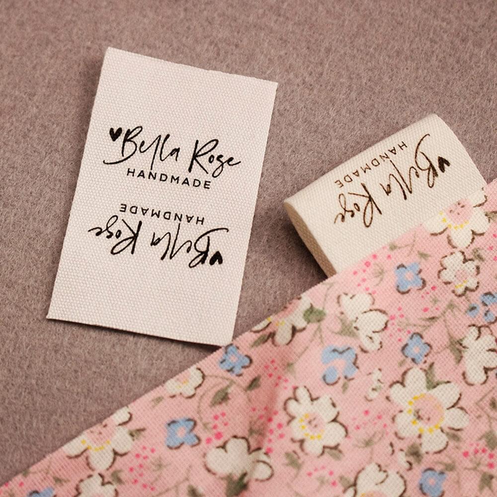 Cotton printed labels – premium custom fabric tags, eco-friendly cotton label printing, MOQ 50 pcs available.